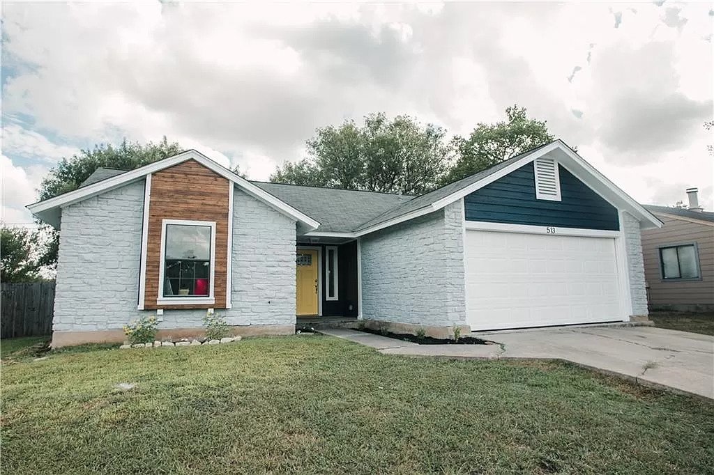 Exterior updates with yellow accent door