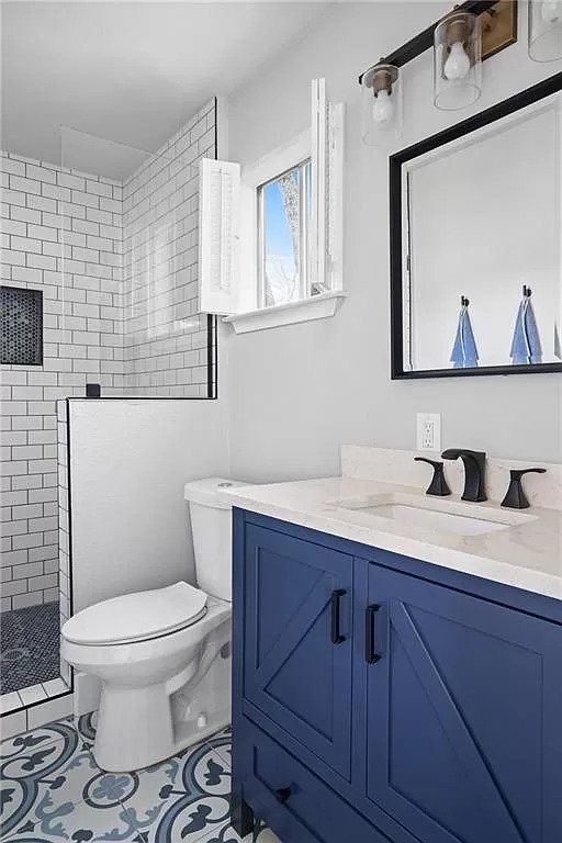 Bathroom remodel with beautiful tile, upgraded vanity and subway tile shower